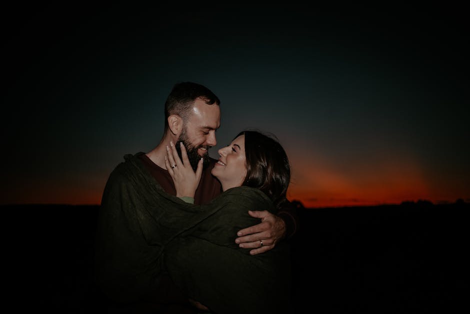 How To Improve Emotional Intimacy In Your Relationship? 12 Couple Laughing While Cooking Together