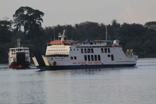Free A picturesque view of two ferries crossing near Nusa Tenggara Barat, showcasing maritime life in Indonesia. Stock Photo