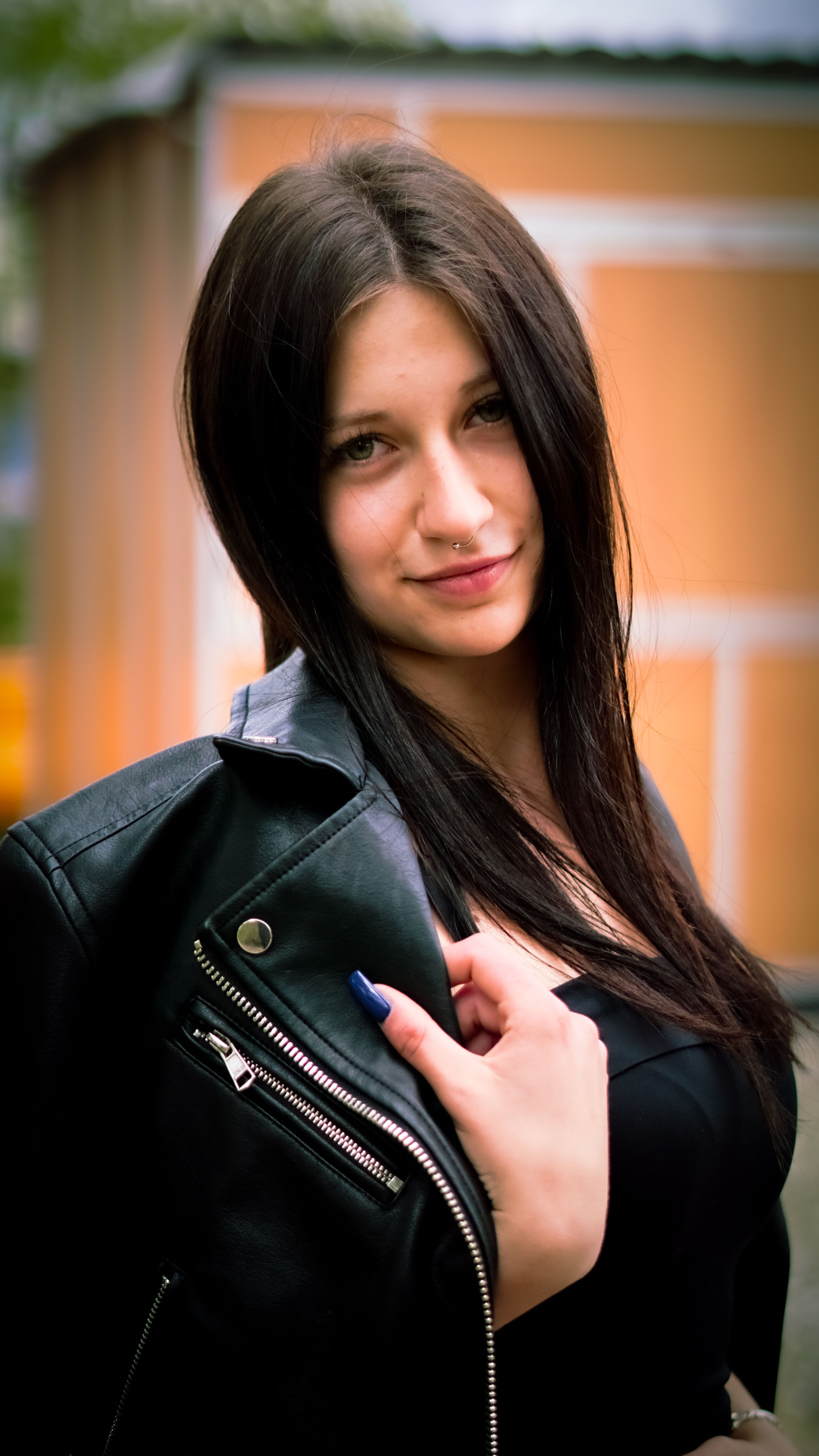 Portrait of Woman in Black Leather Jacket Outdoors · Free Stock Photo