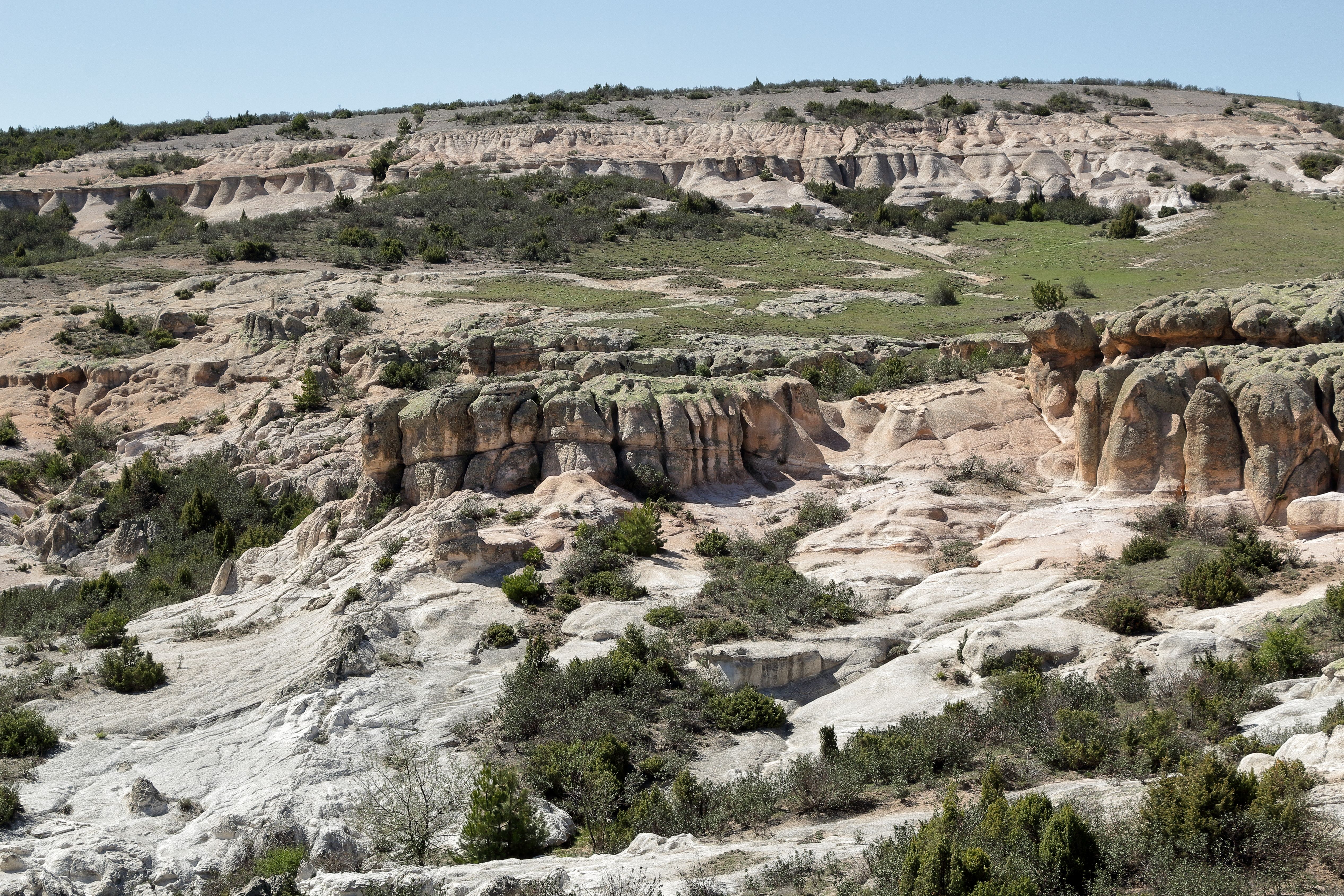 Stunning Eroded Rock Formations in Arid Landscape · Free Stock Photo