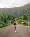 Woman Walking on Road