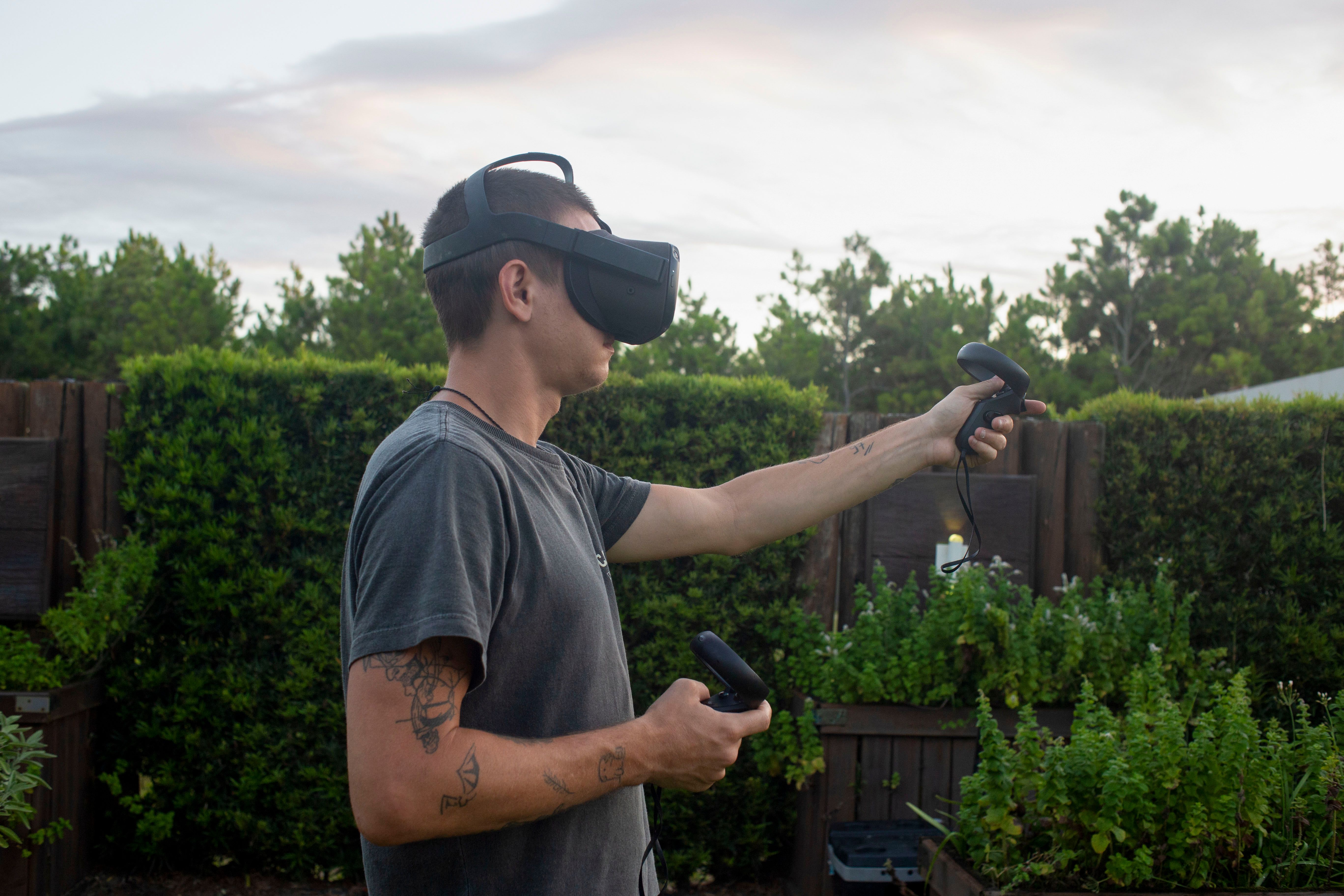 Man Playing Outdoors Using Virtual Reality Headset · Free Stock Photo