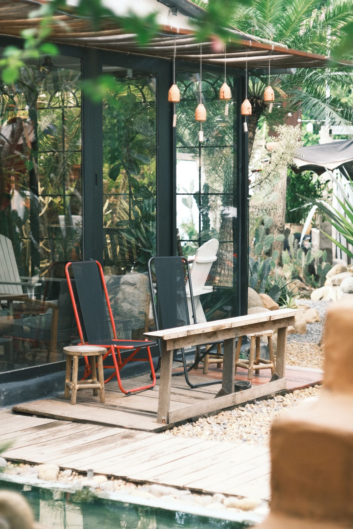 Cozy outdoor seating with rustic charm, perfect for relaxation. Stock Photo.