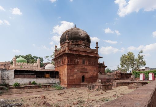 Explore the ancient architectural beauty of Badami, Karnataka with its stunning domed structures.