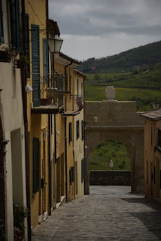 A picturesque street view in San Leo, Italy with a charming architectural scene.