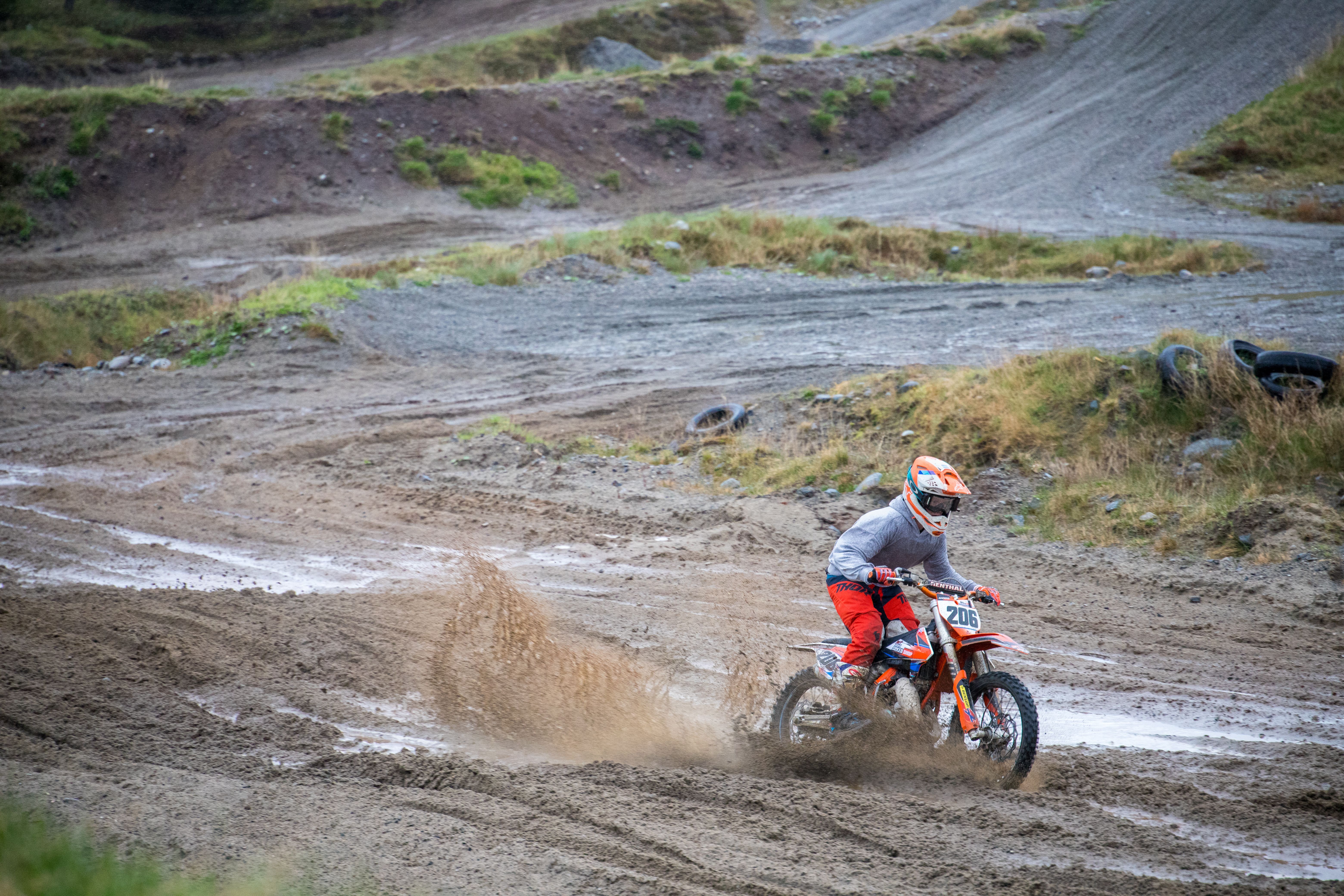 Motocross Rider on Muddy Track in Norway · Free Stock Photo