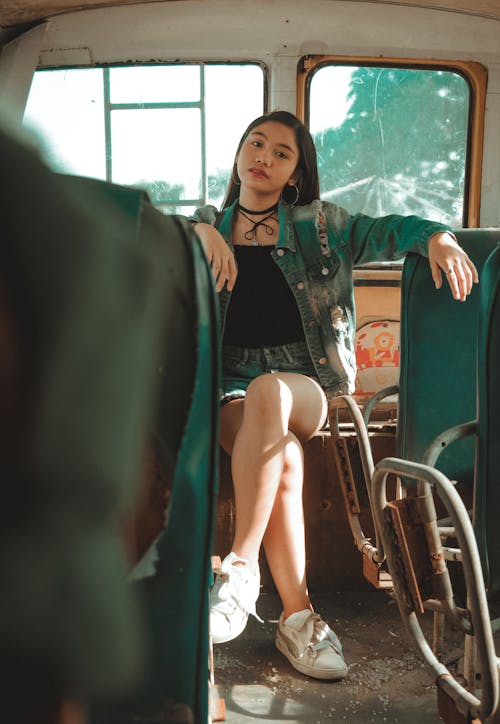Woman Sitting Inside Bus