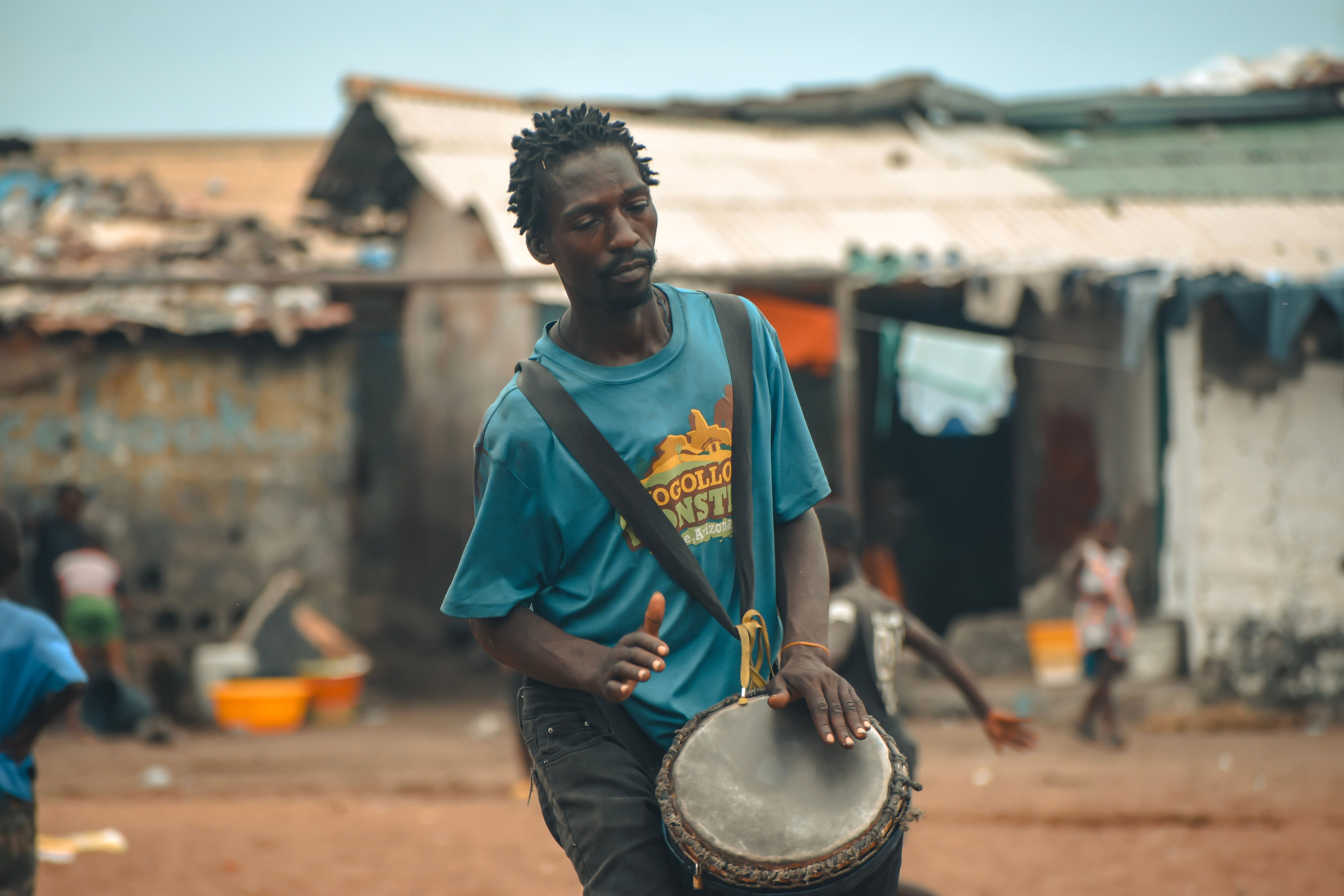 Street Performer Playing Djembe Drum in Monrovia · Free Stock Photo