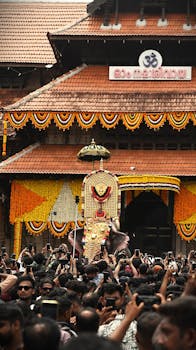 A traditional elephant procession during the Thrissur Pooram festival in Kerala, India.