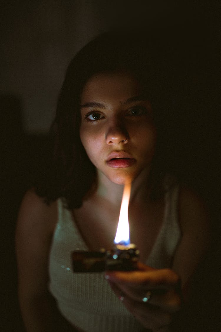 Woman Holding Flip Lighter