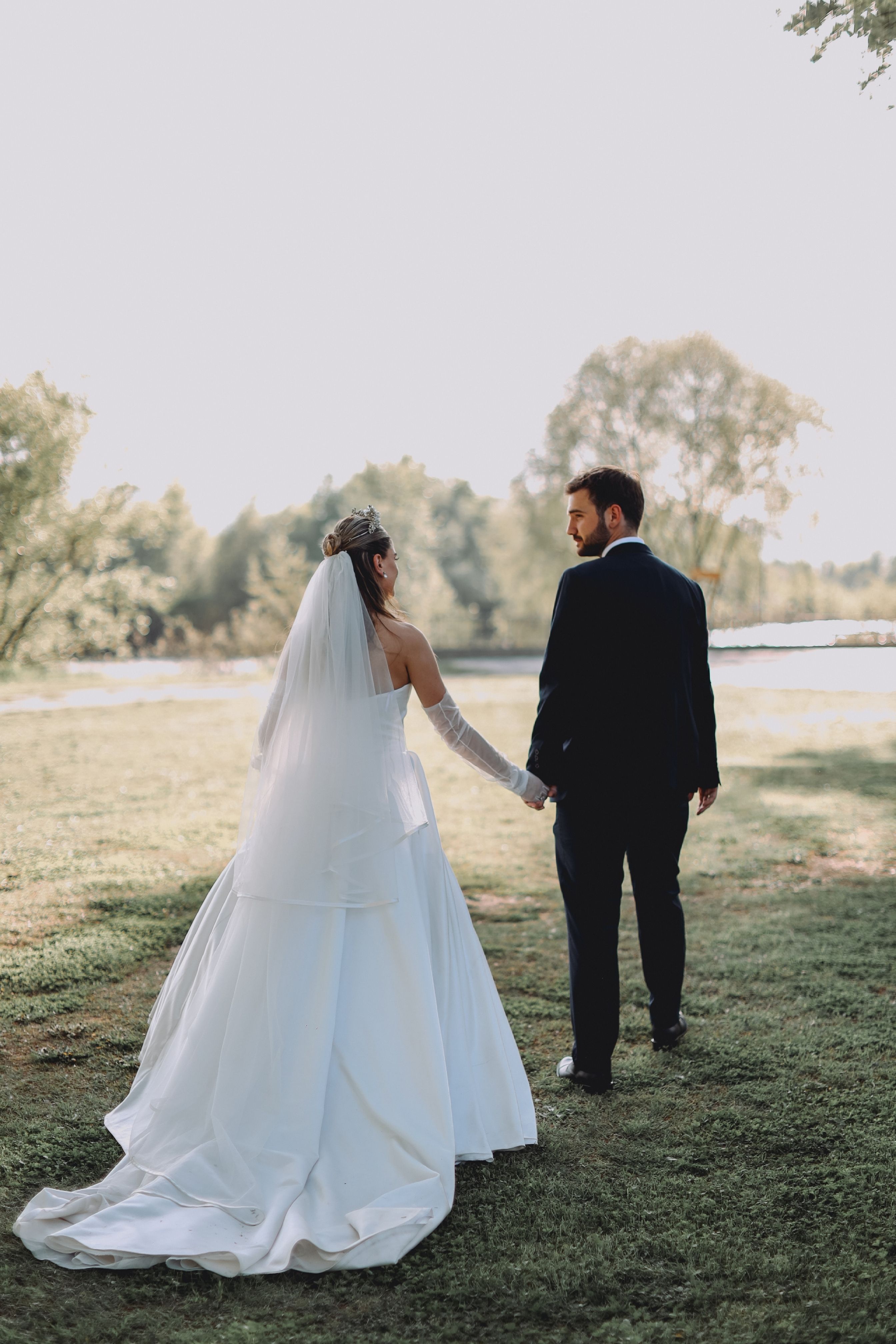 Romantic Outdoor Wedding Couple Holding Hands · Free Stock Photo