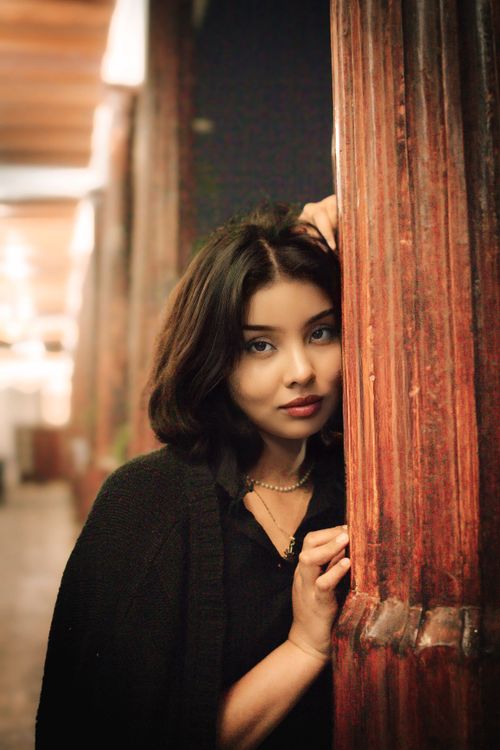 Rustic Woman Face Portrait of a Woman in a Rustic Indoor Setting · Free Stock Photo