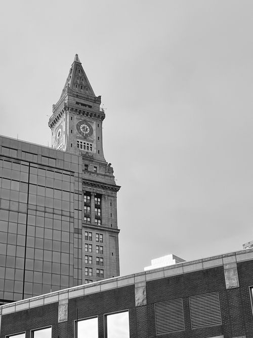 Free Black and white image of Custom House Tower in Boston among modern buildings. Stock Photo