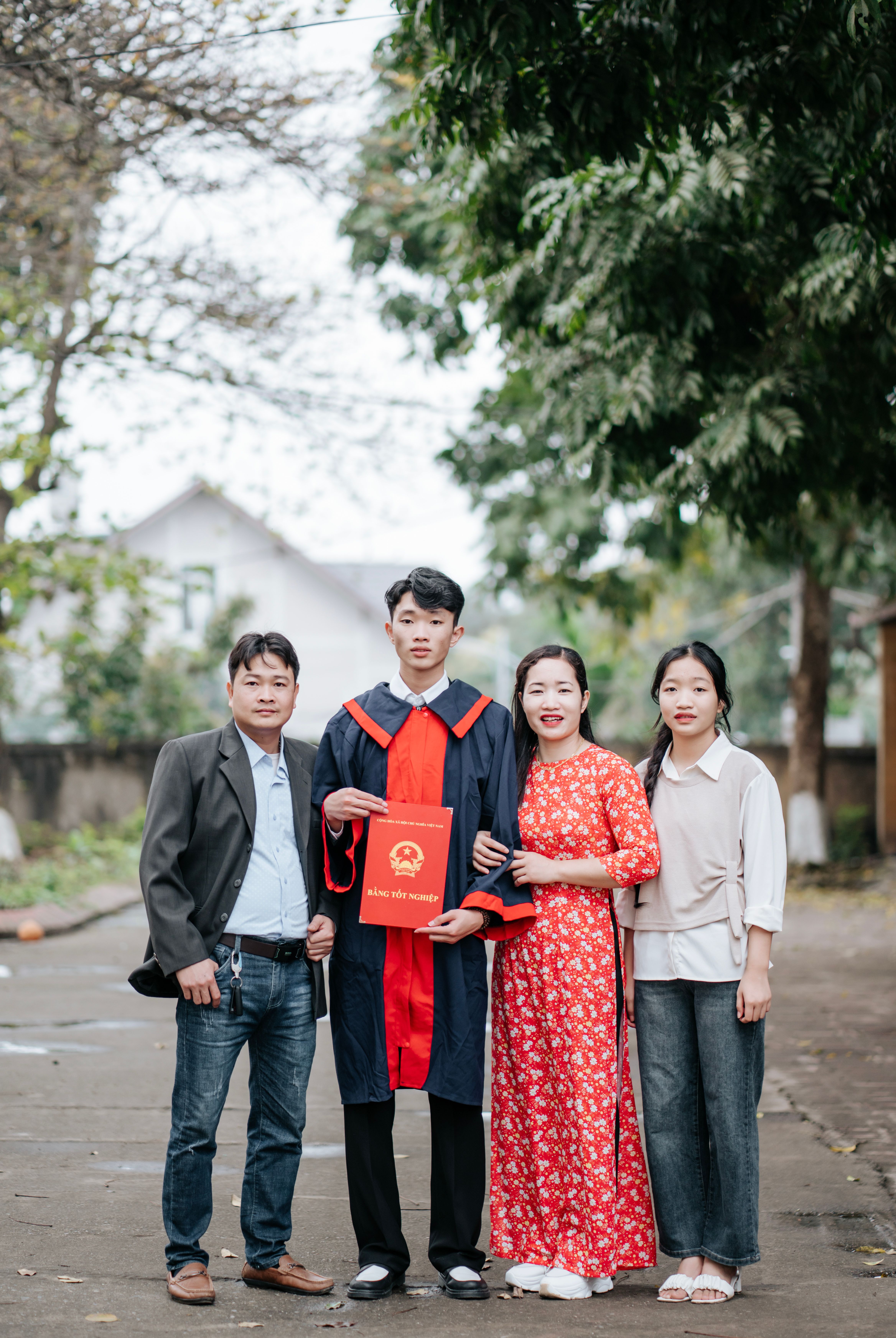 Family Graduation Celebration Outdoors · Free Stock Photo