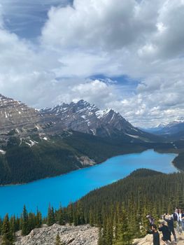 Breathtaking view of Peyto Lake's turquoise waters and Rocky Mountains in Banff.
