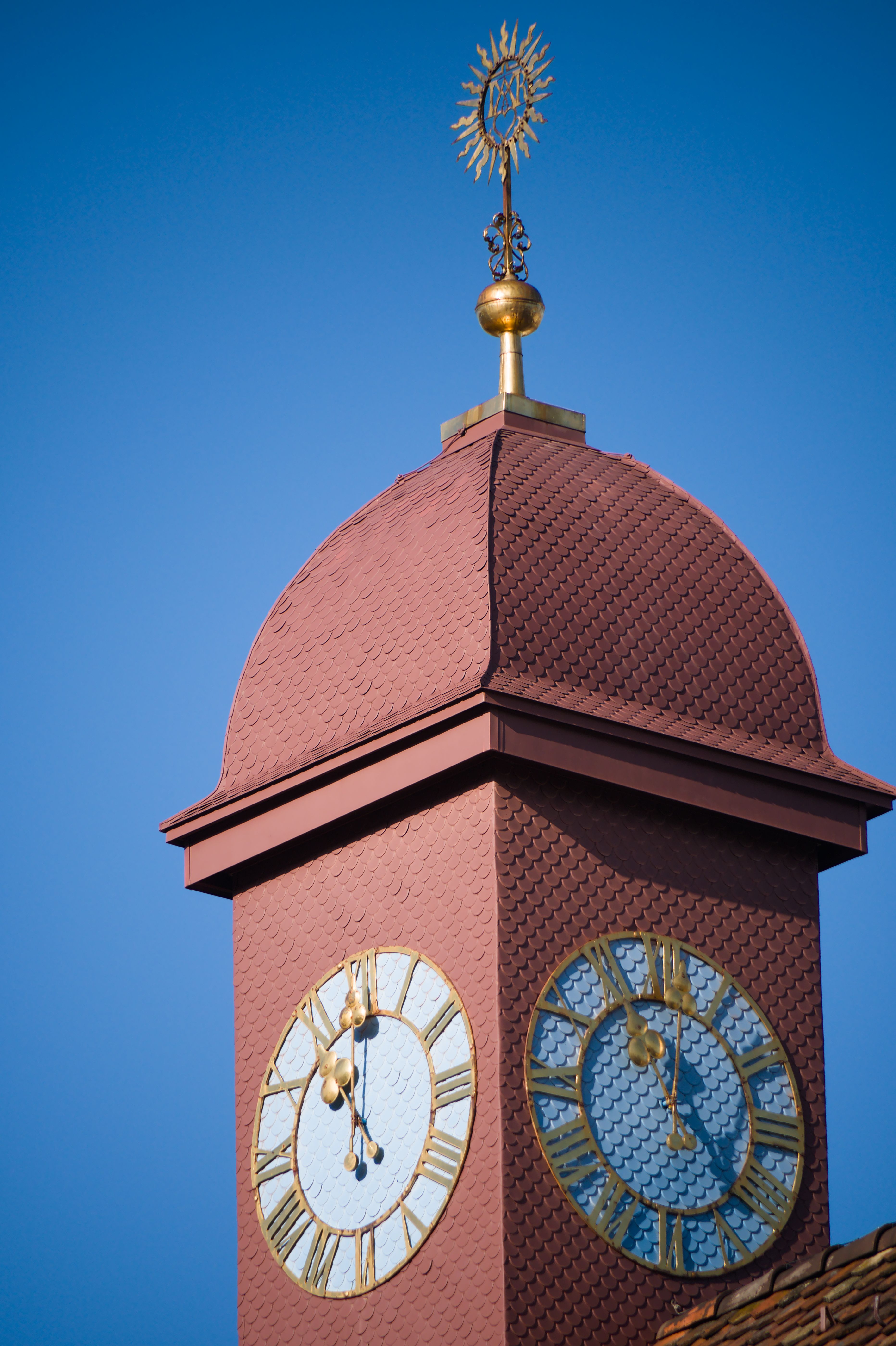 Historic Clock Tower Against Blue Sky · Free Stock Photo