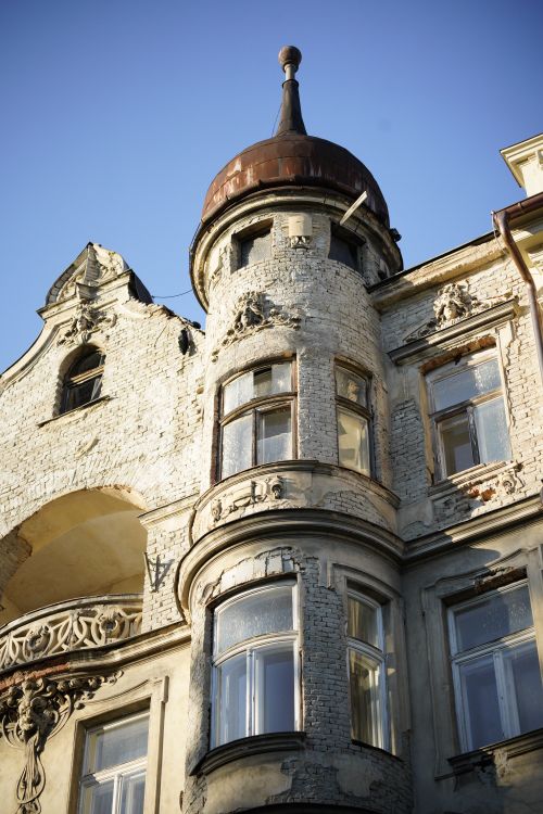 Free A detailed view of historic architecture in Olomouc, showcasing aged facades and architectural details. Stock Photo