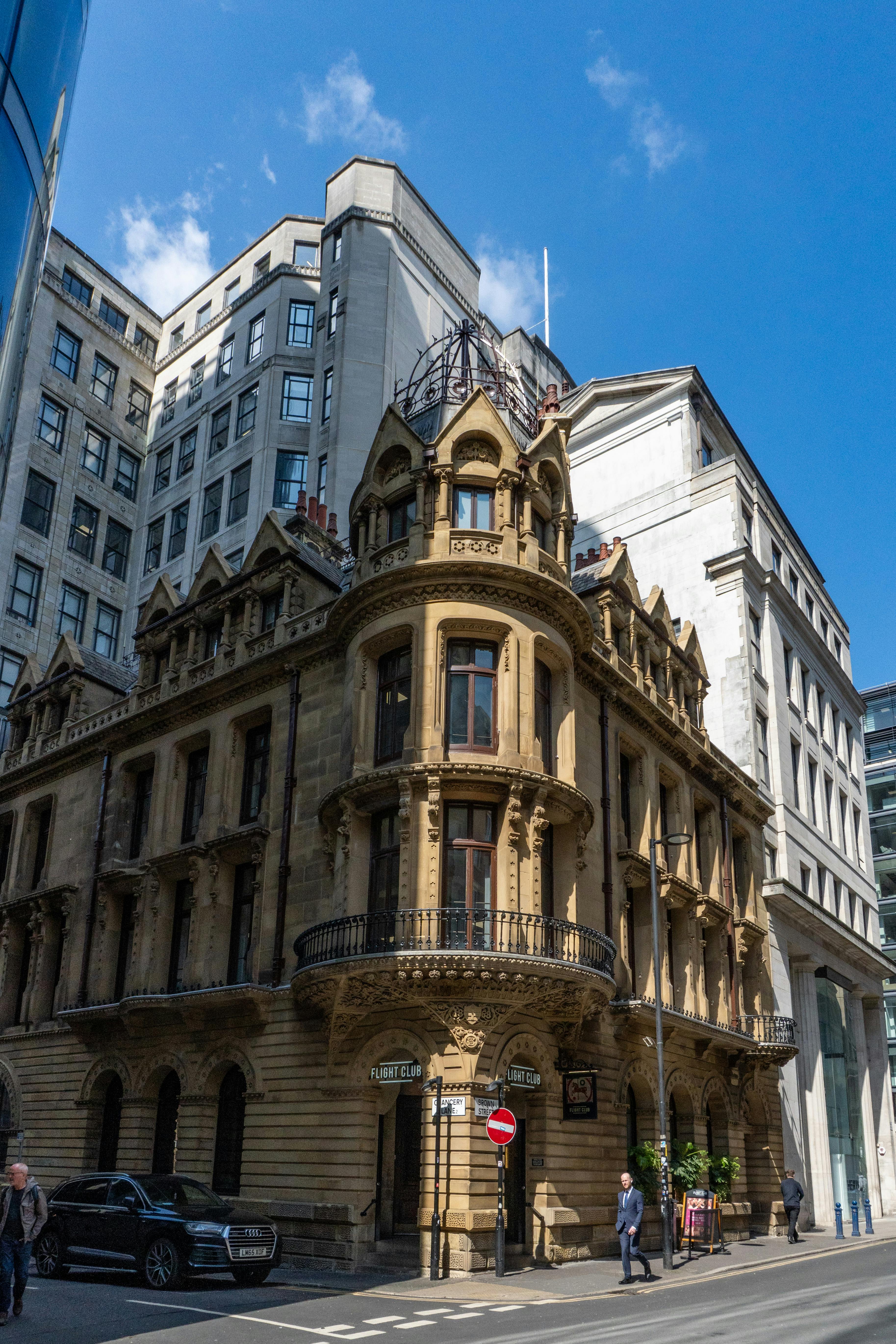 Free Beautiful historic building captured under clear blue skies, showcasing European architectural elegance. Stock Photo
