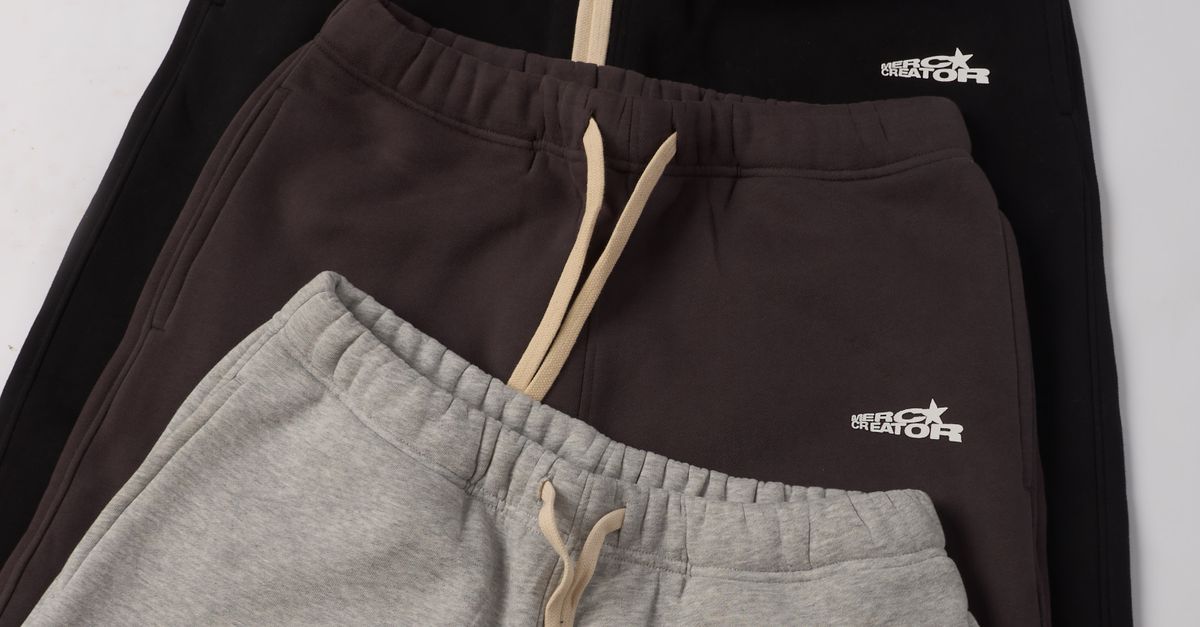Stylish Stack of Three Colorful Sweatpants · Free Stock Photo