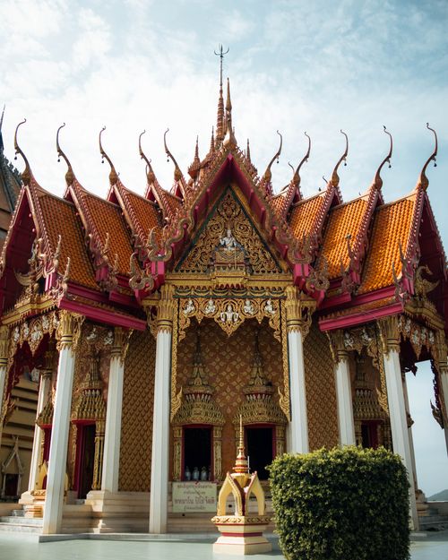 Free A beautifully intricate Buddhist temple in Kanchanaburi, showcasing Thai architectural artistry. Stock Photo
