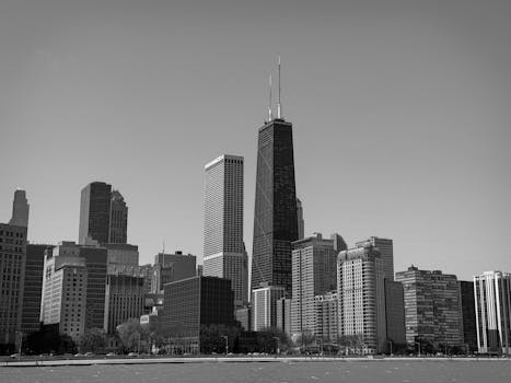 Stunning black and white view of Chicago's skyline featuring iconic skyscrapers on a clear day.