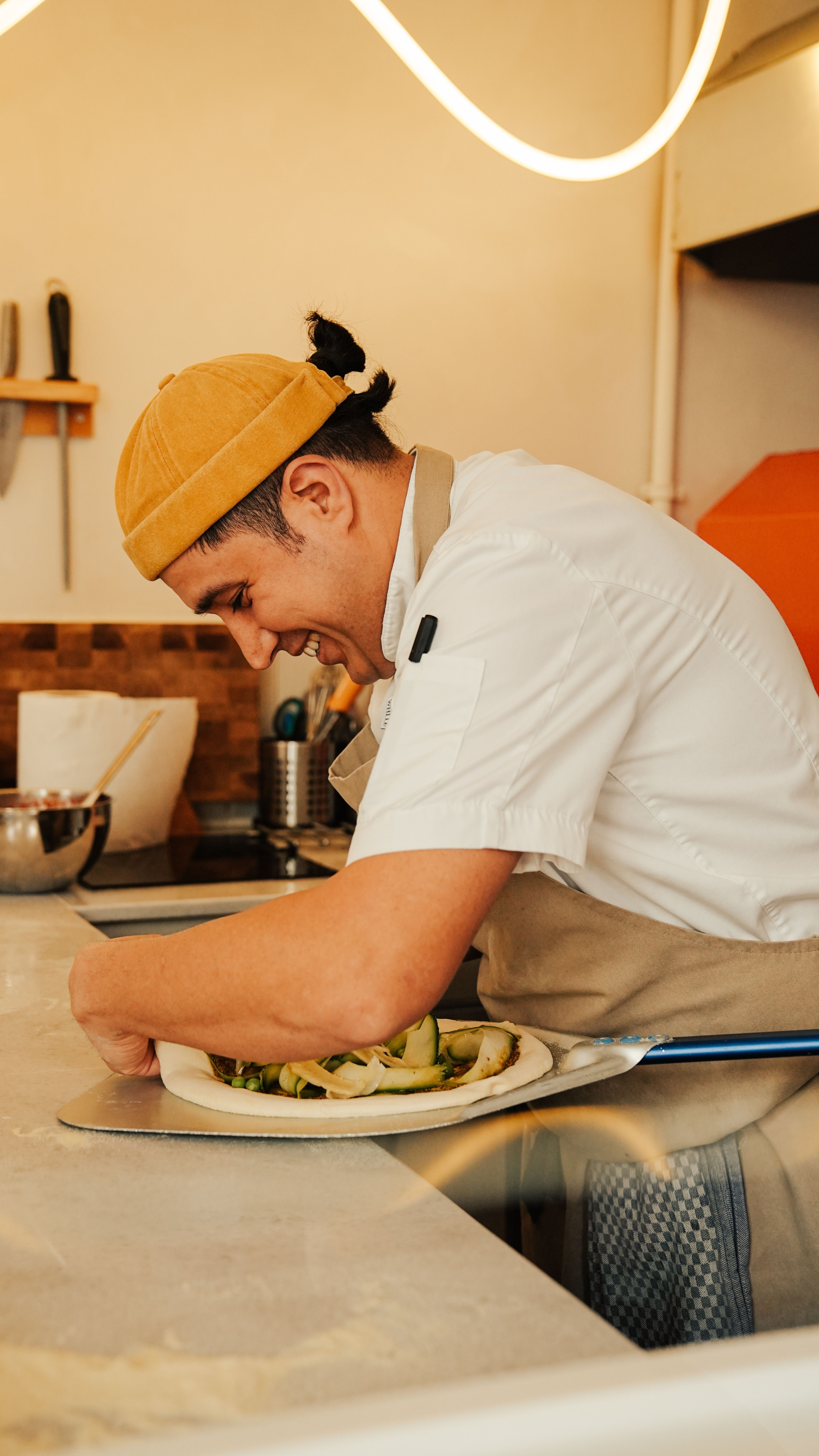 Chef portrait in a warm kitchen