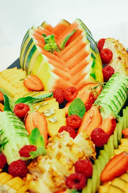 Free Colorful fruit platter featuring watermelon, strawberries, raspberries, and more, perfect for a refreshing summer treat. Stock Photo