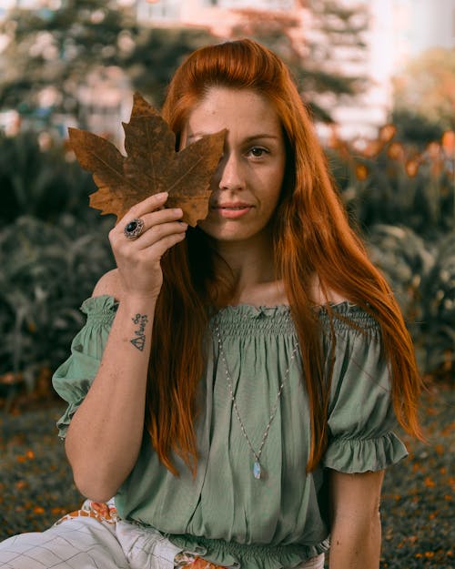 Woman Wearing Green Top