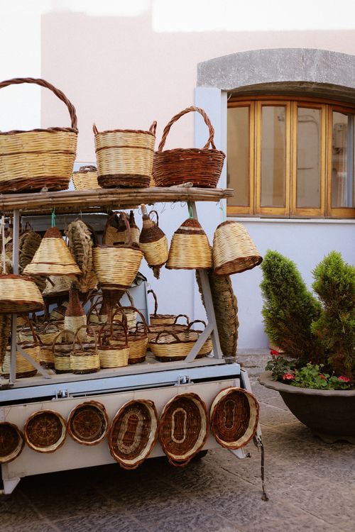 Free A collection of handmade wicker baskets displayed outdoors, showcasing artisanal craftsmanship. Stock Photo