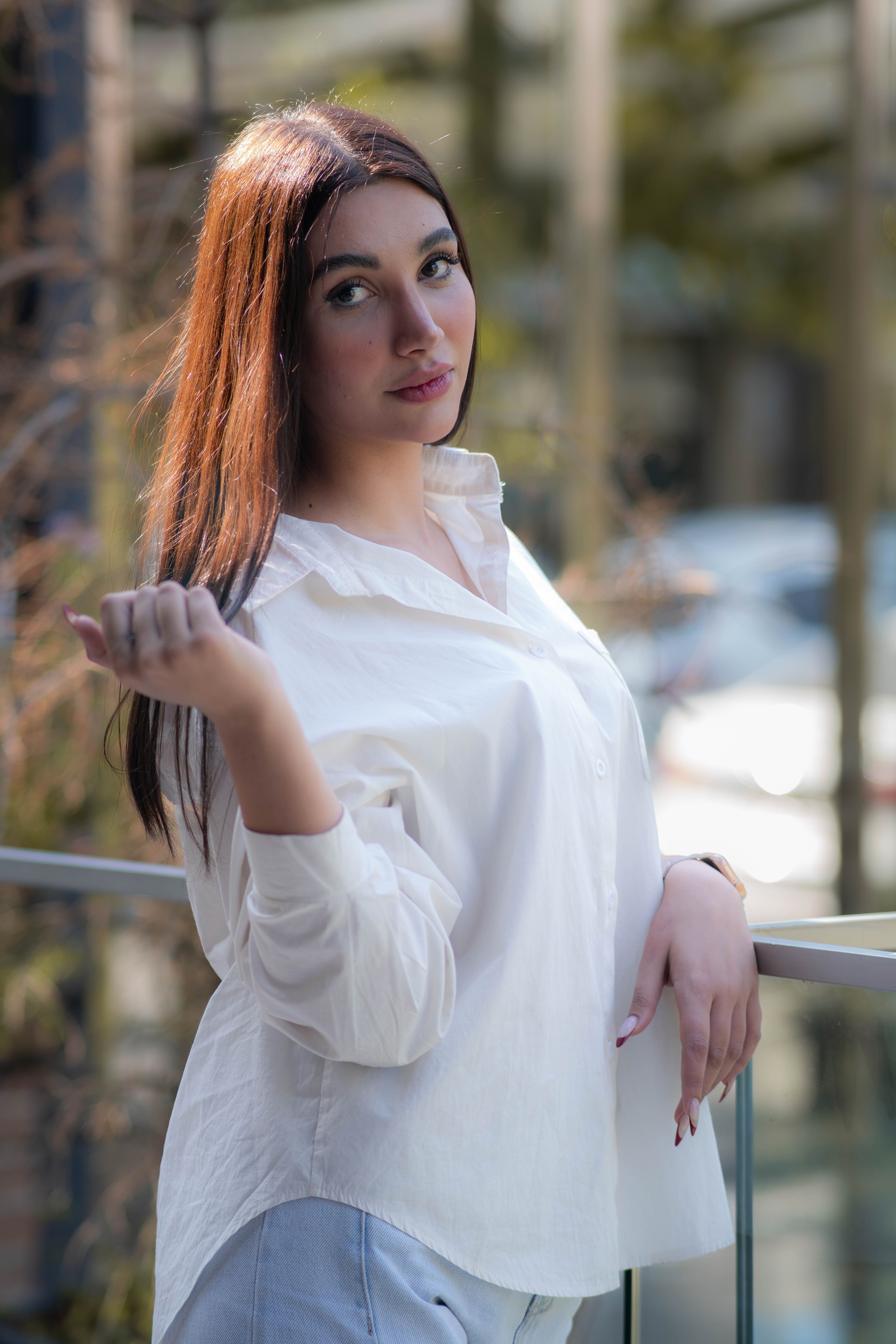 Portrait of a Woman in White Shirt Outdoors · Free Stock Photo