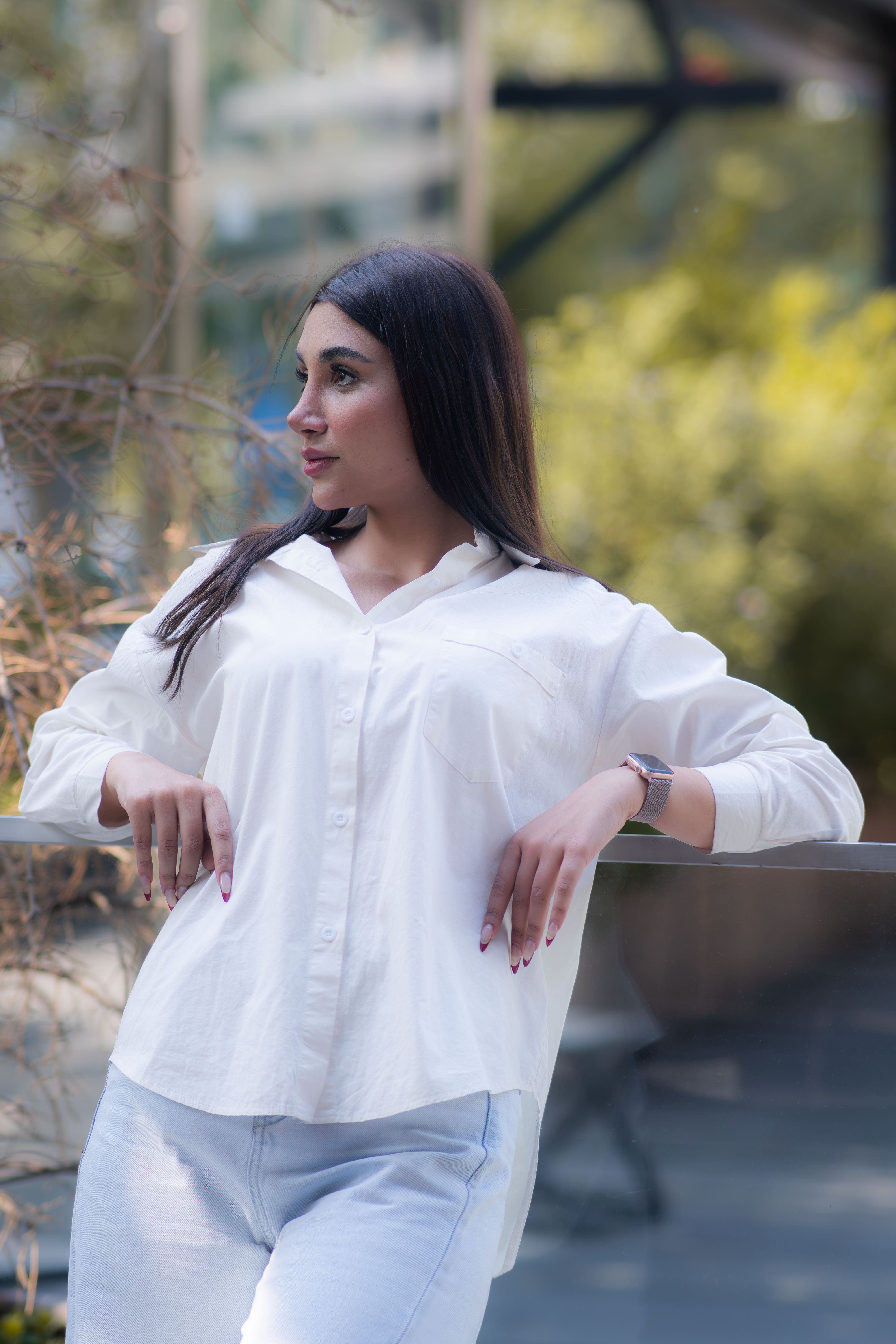 Elegant Woman in White Shirt Outdoors · Free Stock Photo