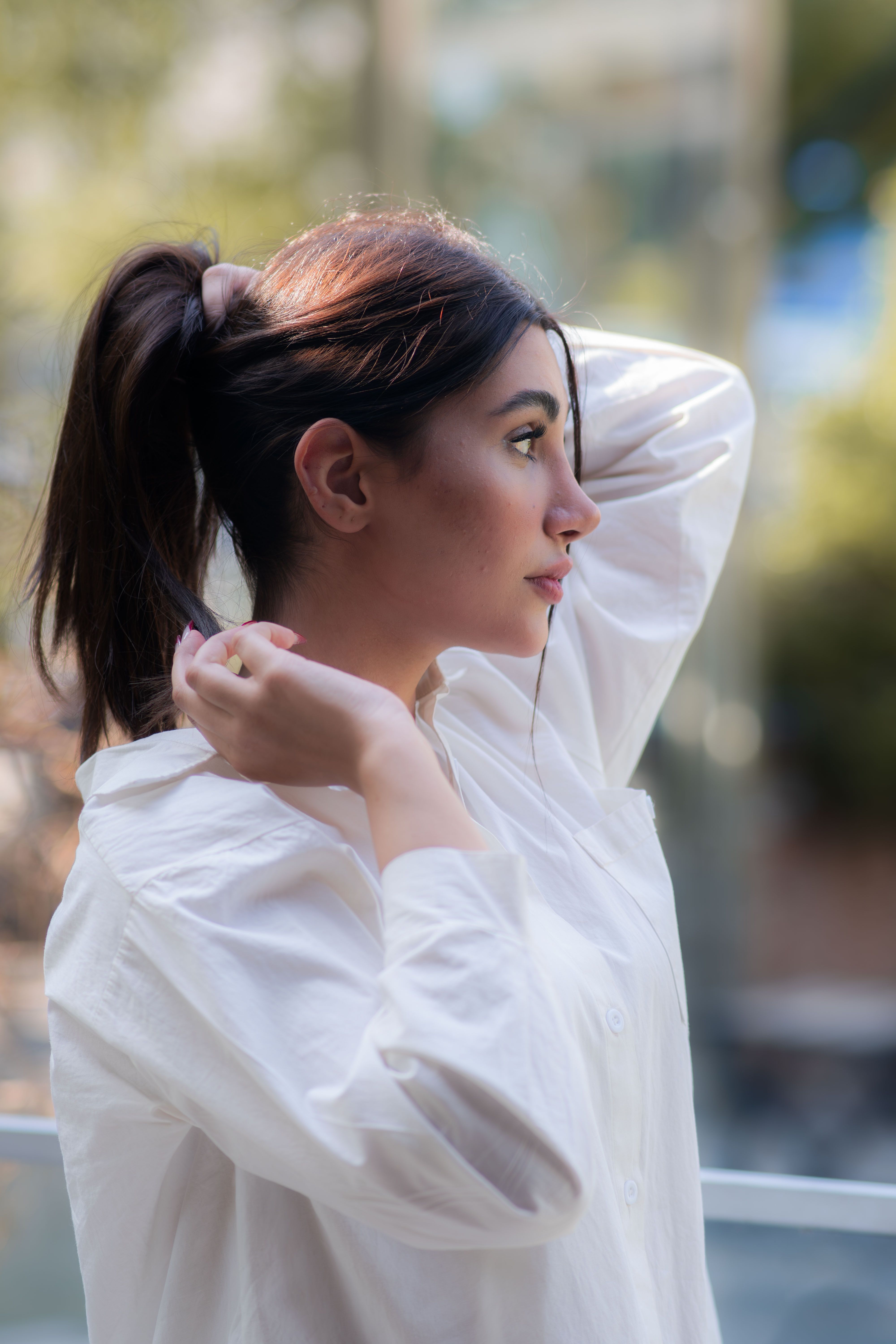 Stylish Woman in White Shirt Outdoors · Free Stock Photo