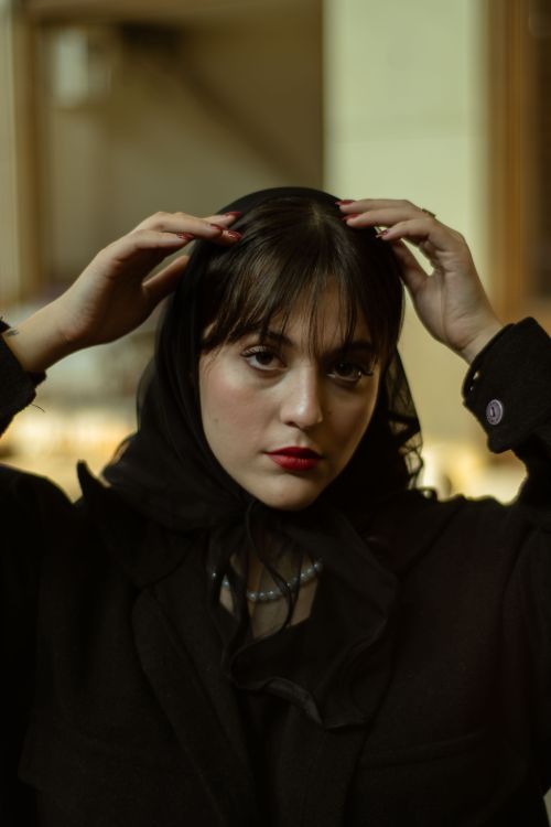 Free Serene portrait capturing a woman's elegance in Tehran, Iran. Stock Photo