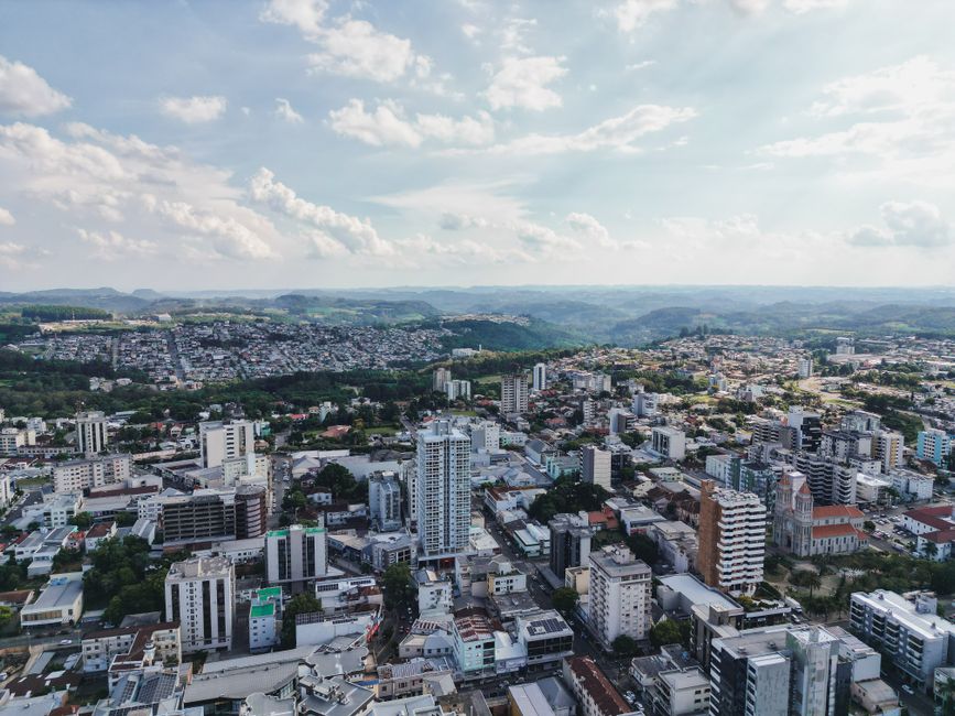 Stunning aerial shot of Farroupilha, capturing the city's skyline and surrounding landscape.