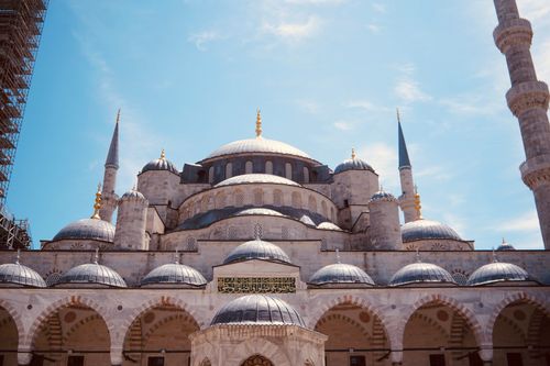 Free The majestic Blue Mosque in Istanbul, showcasing its iconic domes and minarets against a clear sky. Stock Photo