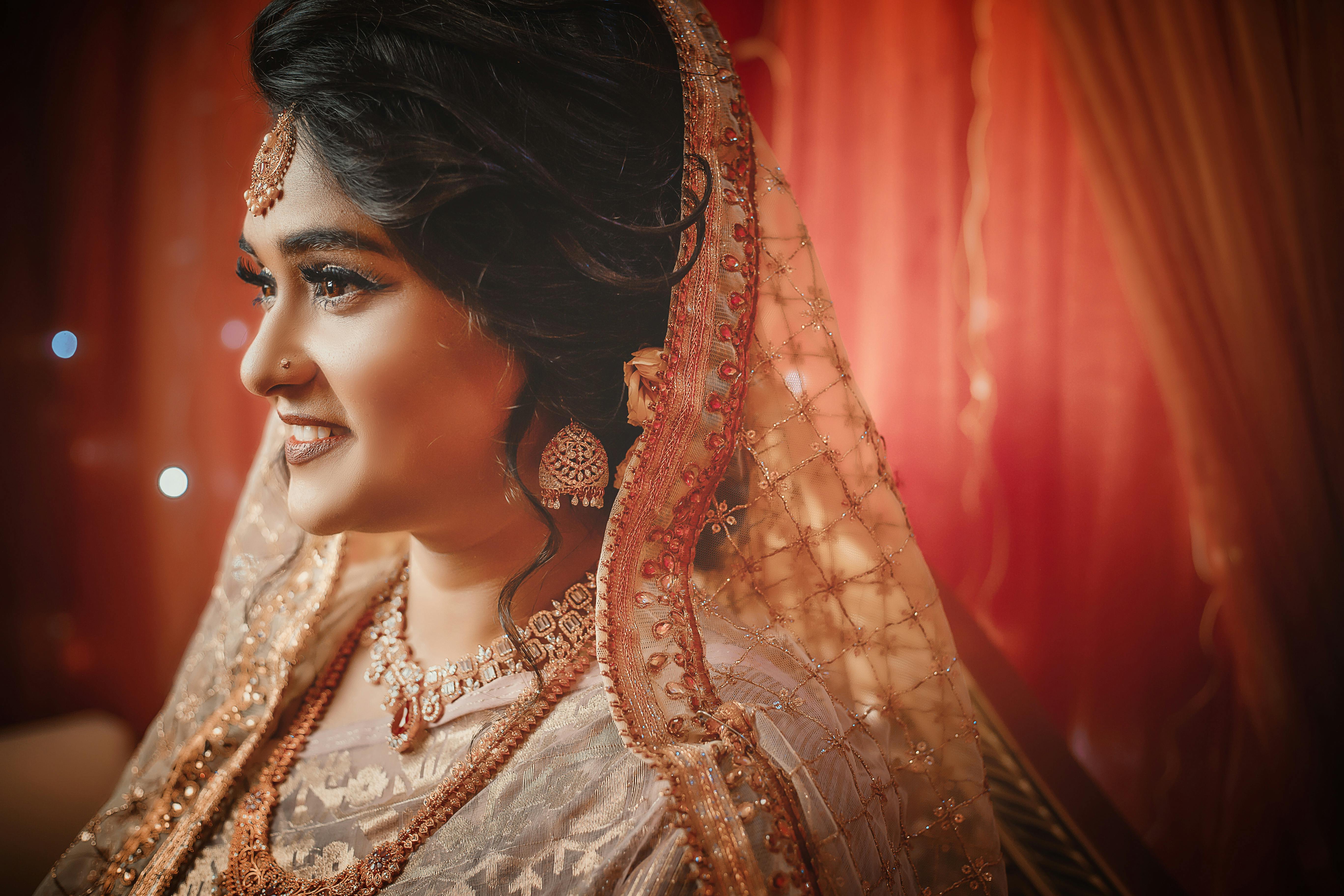 Shallow Focus Photo of Woman in Brown and Gray Sari Dress