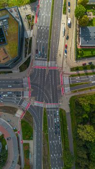 Aerial view of a busy urban intersection in Kraków, Poland, showcasing traffic dynamics.