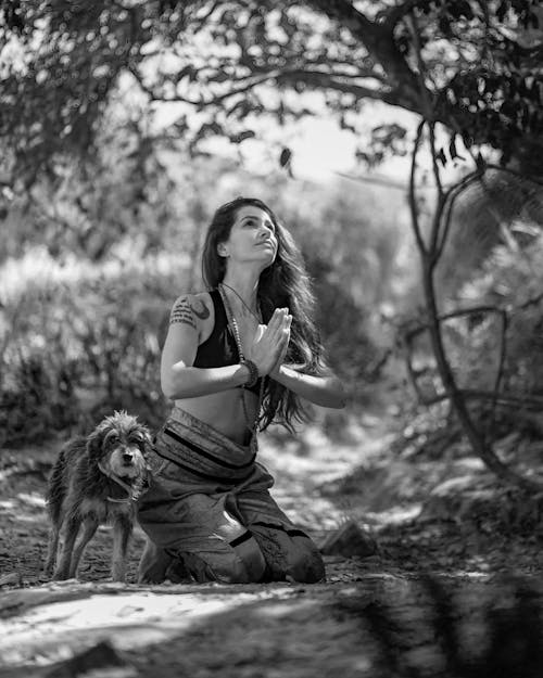 Woman and Dog Near Tree