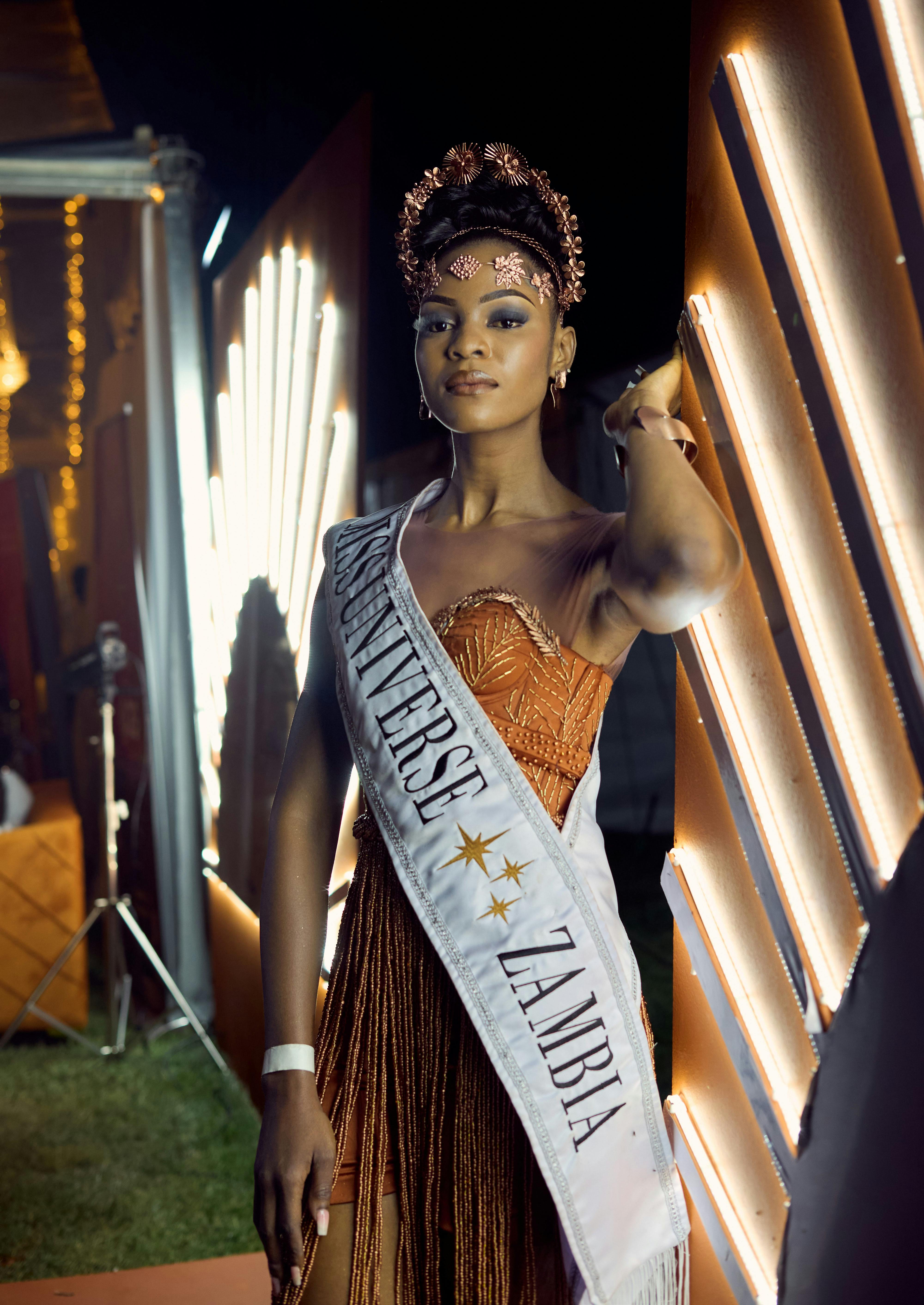 Stunning portrait of a Zambian beauty queen in a glamorous evening gown.
