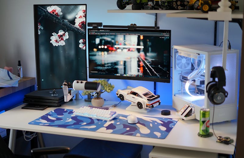Gaming PC and dual monitor desk setup