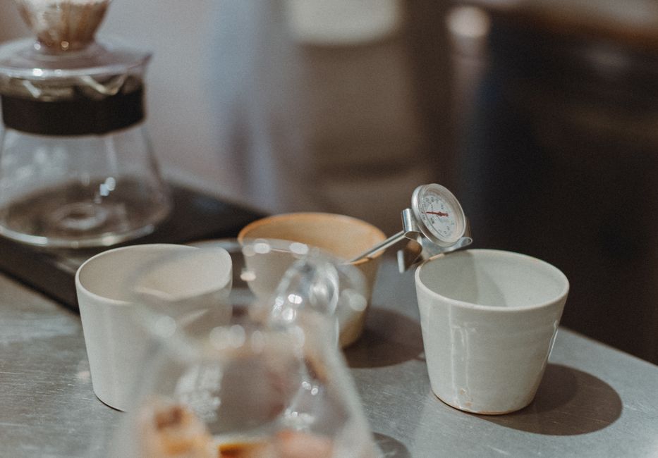 Close-up of coffee brewing equipment in a Japanese cafe, capturing the art of coffee preparation.