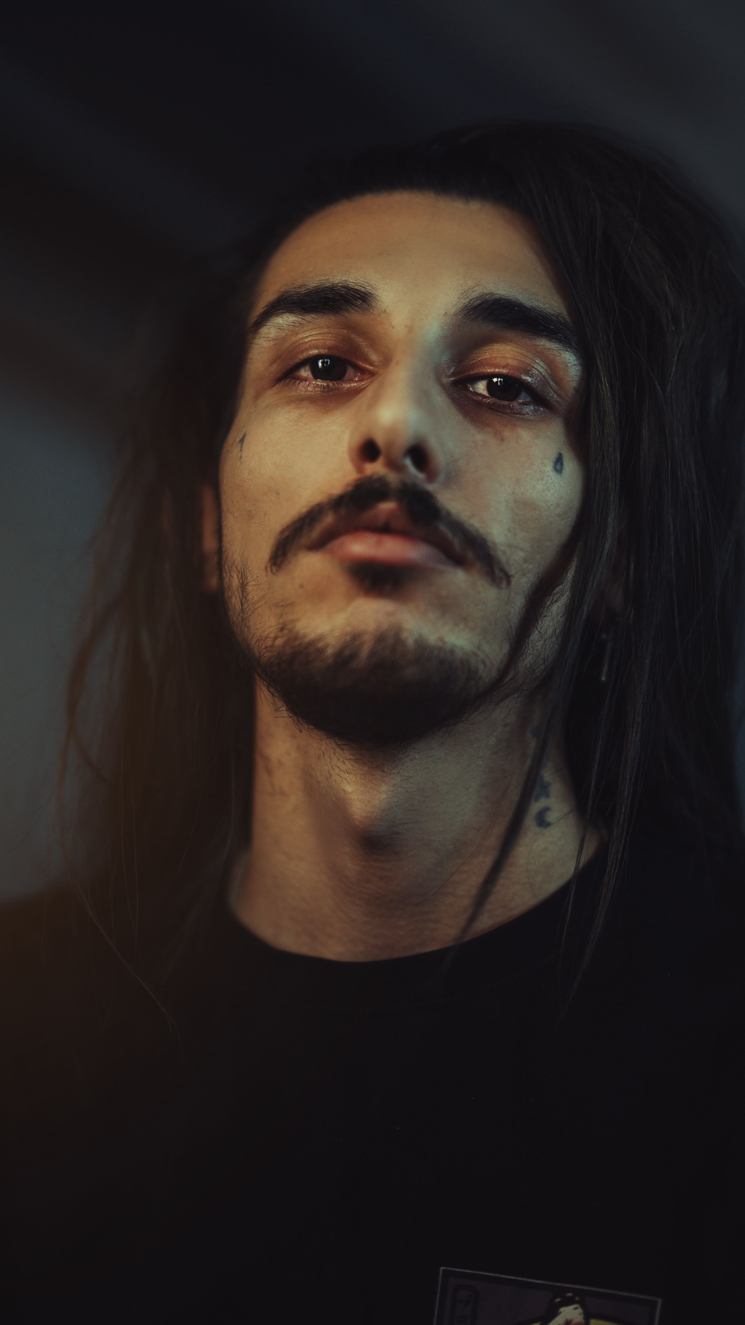 Moody Portrait of Man with Tattoos