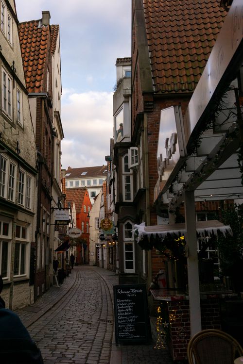 Free Discover the picturesque medieval street with charming historic architecture perfect for travel adventures. Stock Photo