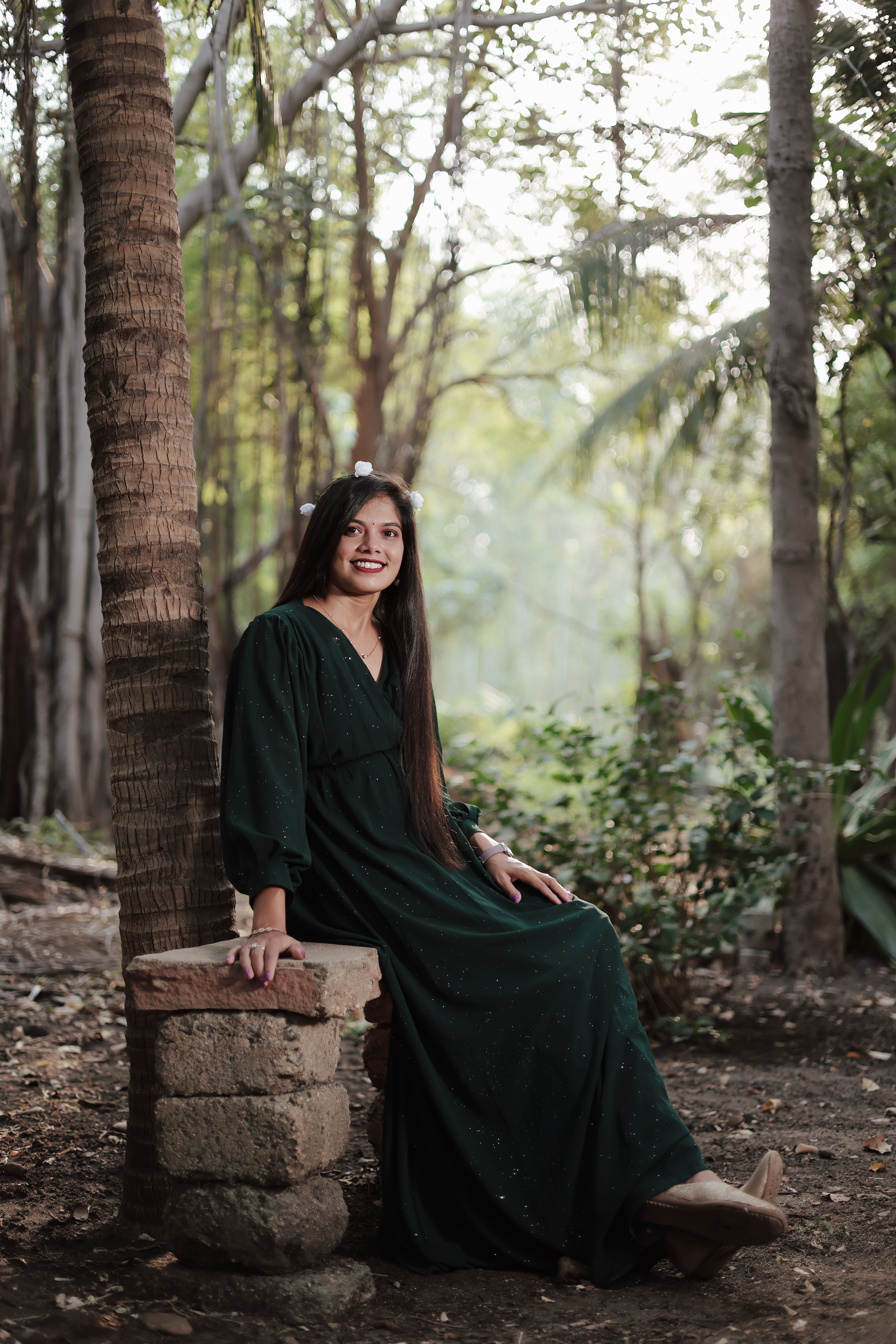 Woman in Green Dress Posing among Trees · Free Stock Photo