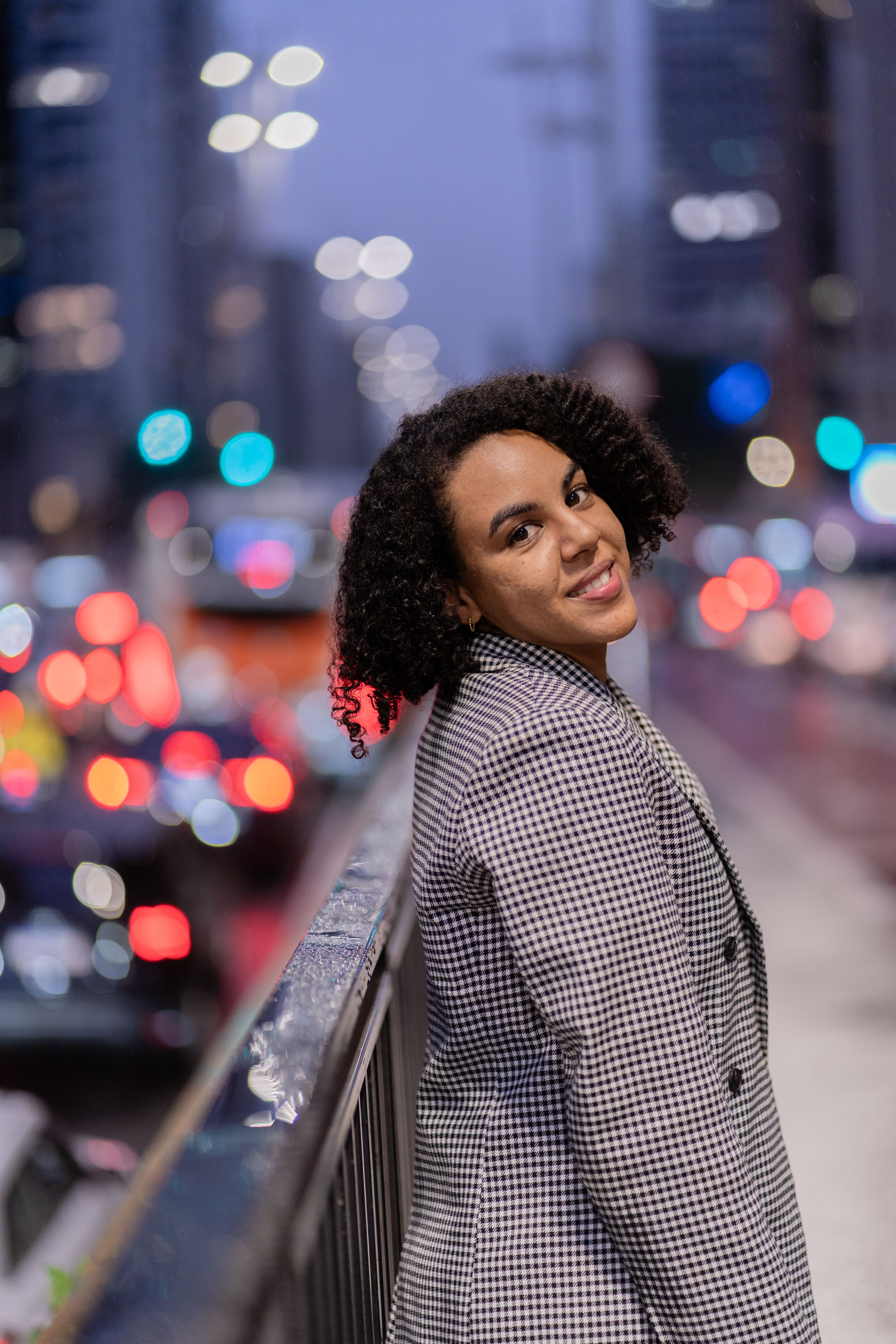Portrait of a Woman in City Street at Dusk · Free Stock Photo