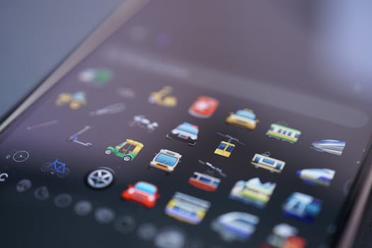 Vibrant close-up of various emojis on a smartphone screen representing digital communication.