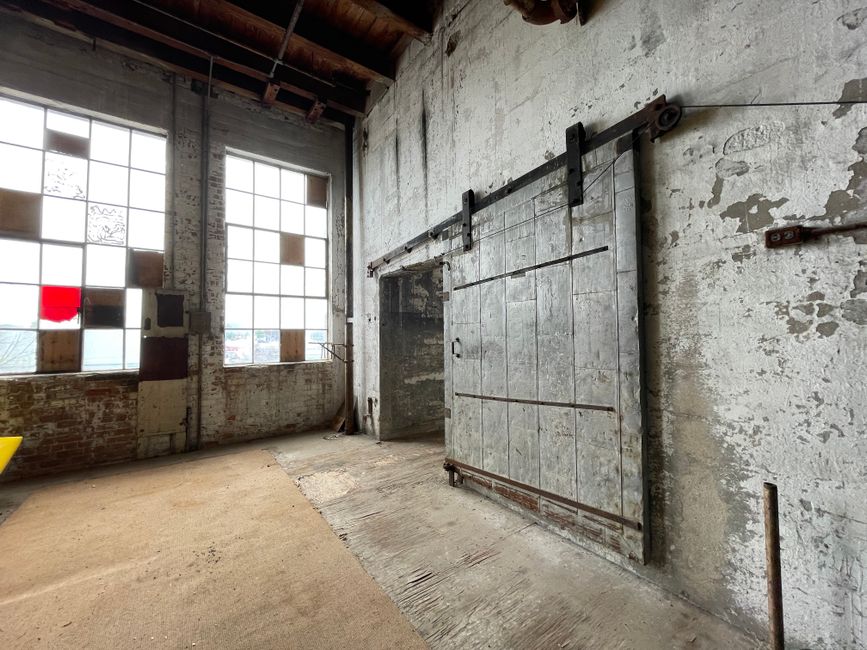 Historic warehouse loft interior with exposed brick and tall windows - 1 bedroom apartments northeast minneapolis Historic warehouse loft interior with exposed brick and tall windows - 1 bedroom apartments northeast minneapolis