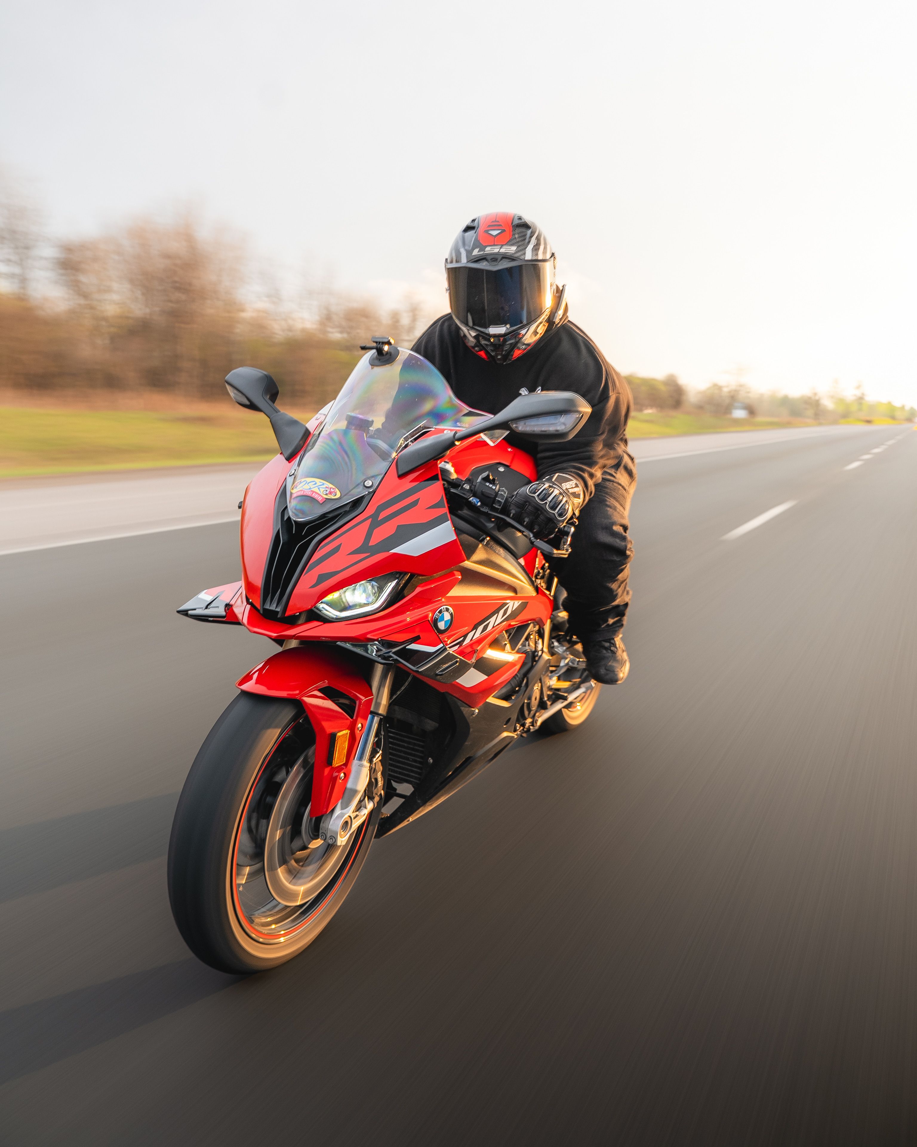 Dynamic Ride on Red Sport Motorcycle · Free Stock Photo