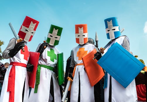 Group of people in colorful knight cosplay with shields and helmets outdoors.
