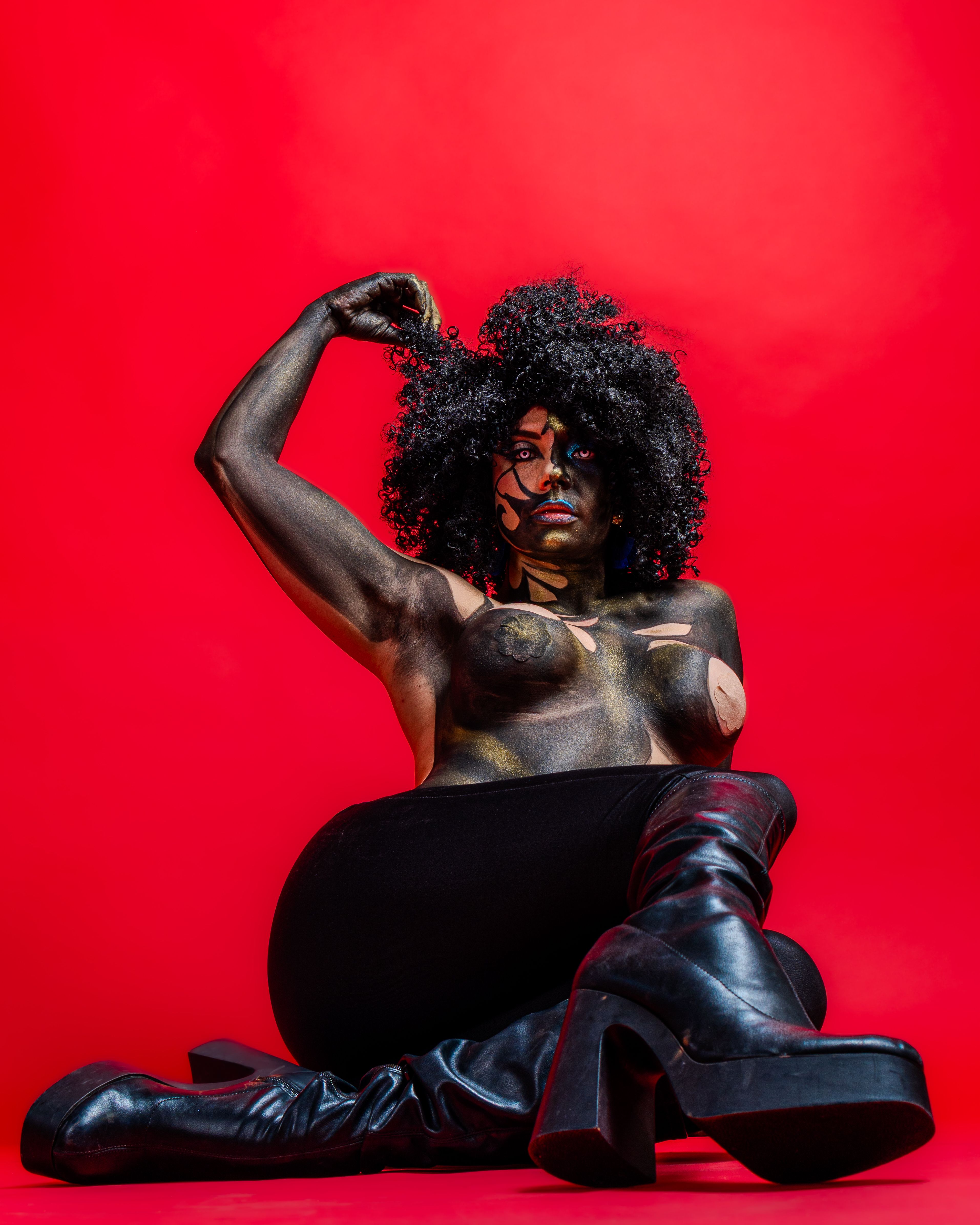 Expressive Bodypaint Portrait on Red Background · Free Stock Photo